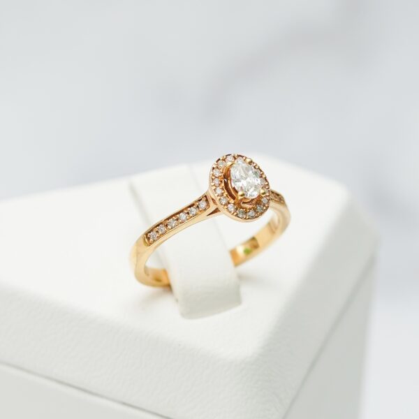 Oval Diamond Halo Ring in Rose Gold